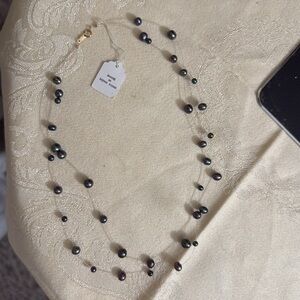 14k Double strand floating silvery black , purple pearl necklace.16” long BNWT.
